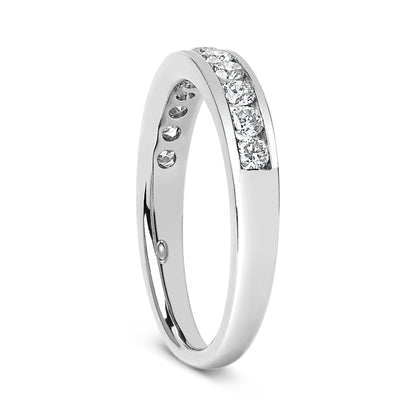 White metal ring shown at a slight angle with a channel setting of round white gemstones on the upper surface.
