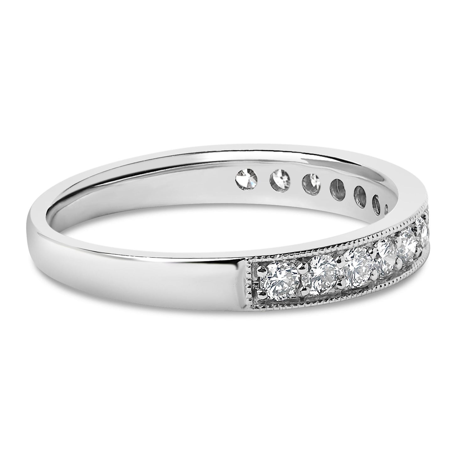 Close-up angled view of a white ring with a row of round white gemstones set in a micro-pave setting along the top.