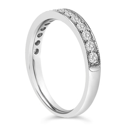 White jewelry ring shown at an angle with a row of round white gemstones set in micro-pave setting along the top surface.