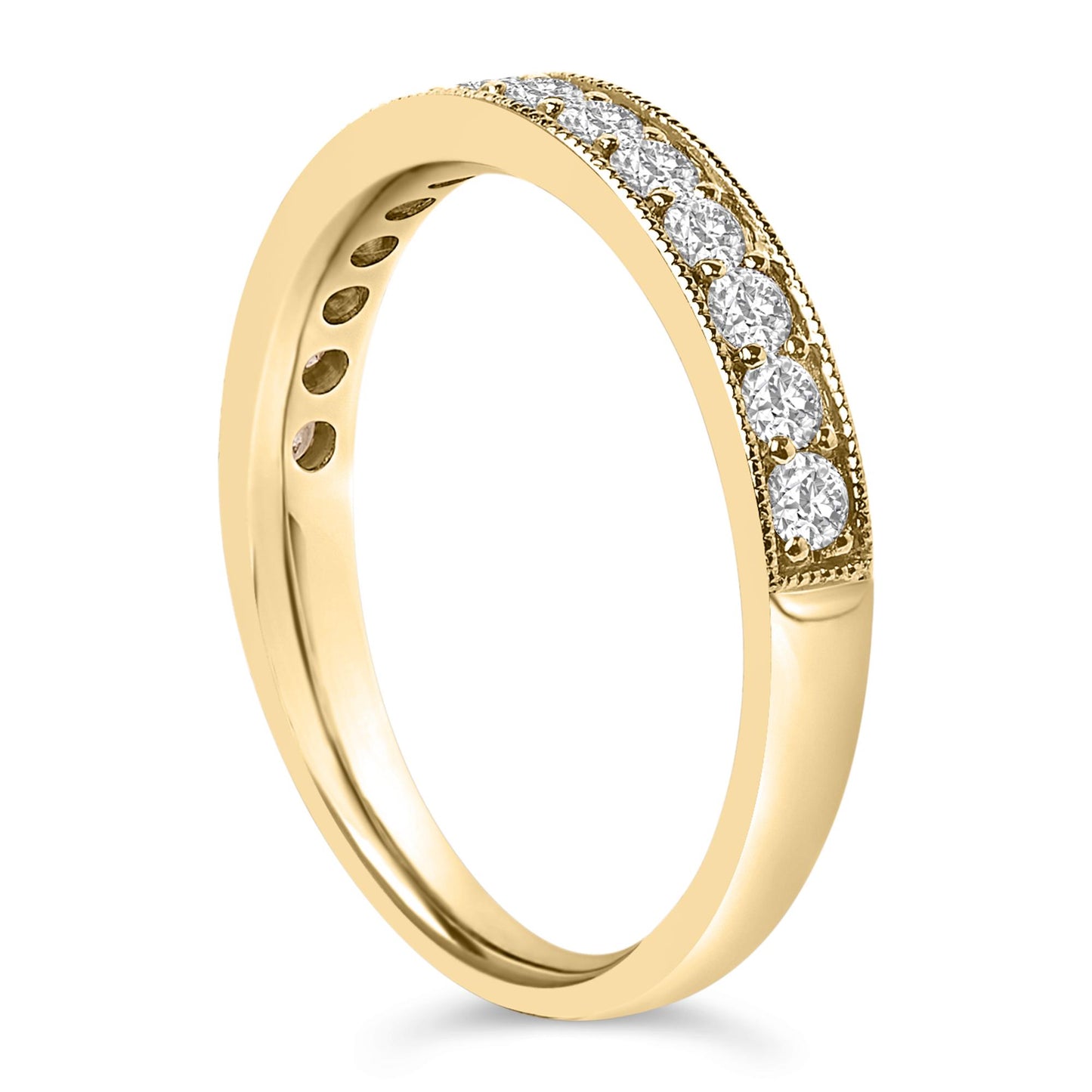 Close-up angled view of a yellow ring featuring a row of white round gemstones in a micro-pave setting along the upper band.