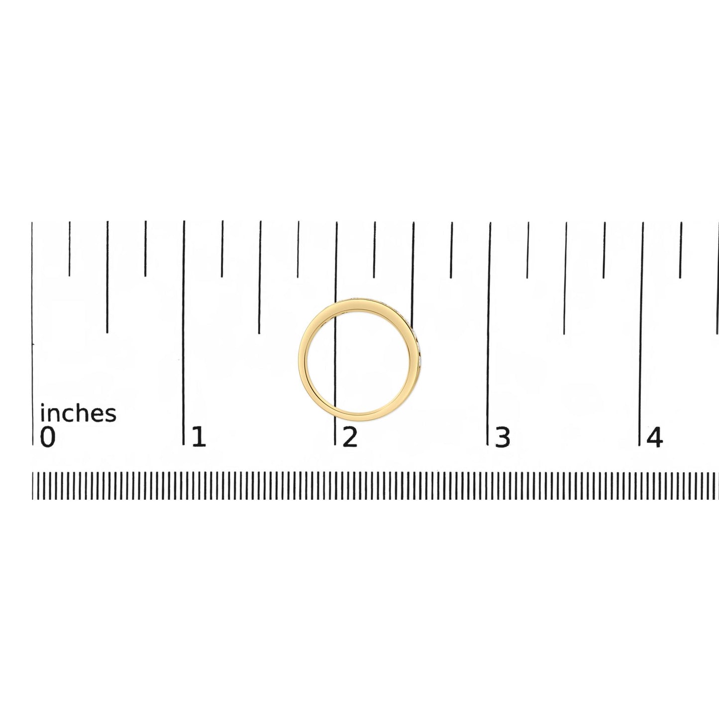 Yellow metal ring with round white gemstones in micro-pave setting, shown on a scale from a top-down angle.