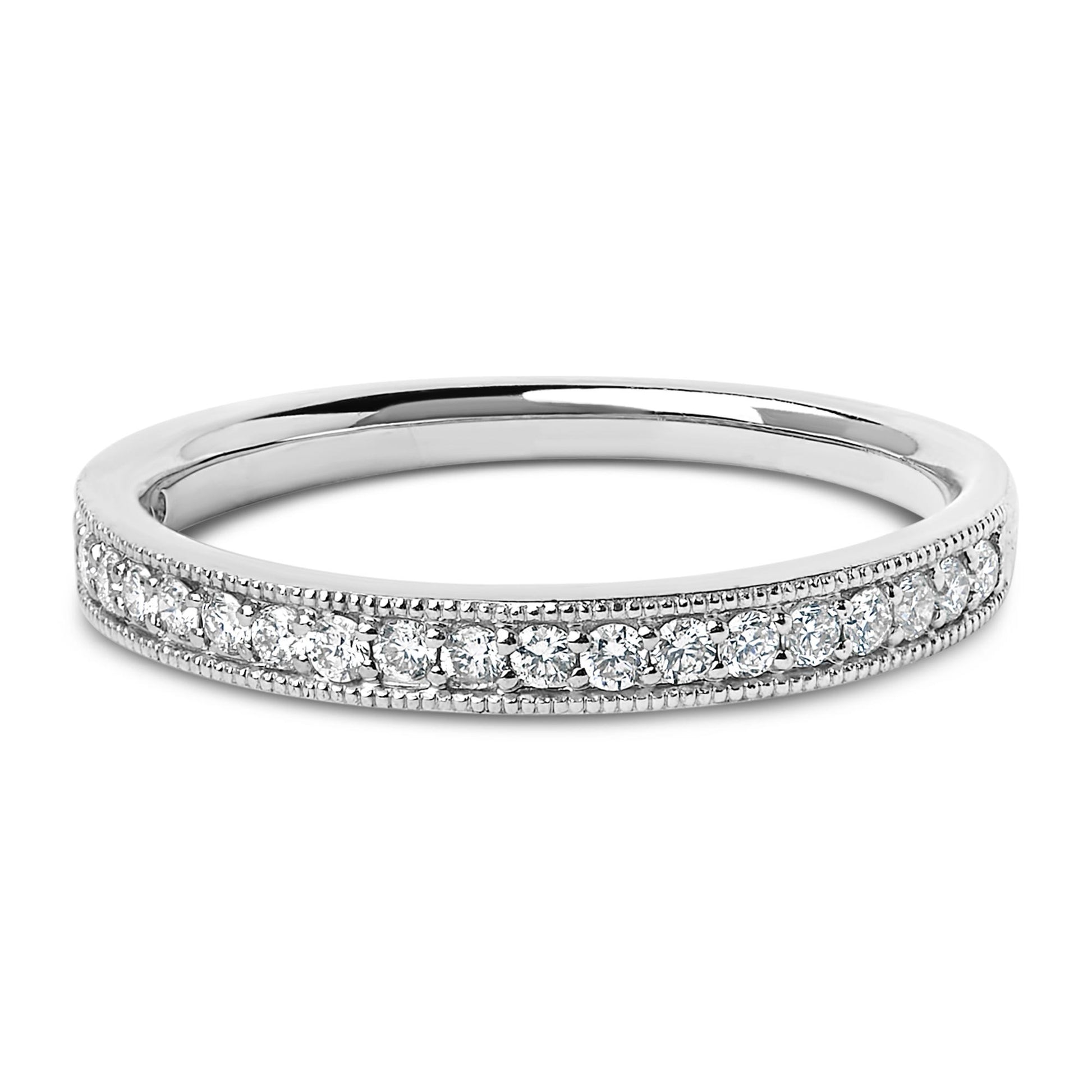 Close-up front angle of a white metal ring featuring a row of round white gemstones in a micro-pave setting along the band.