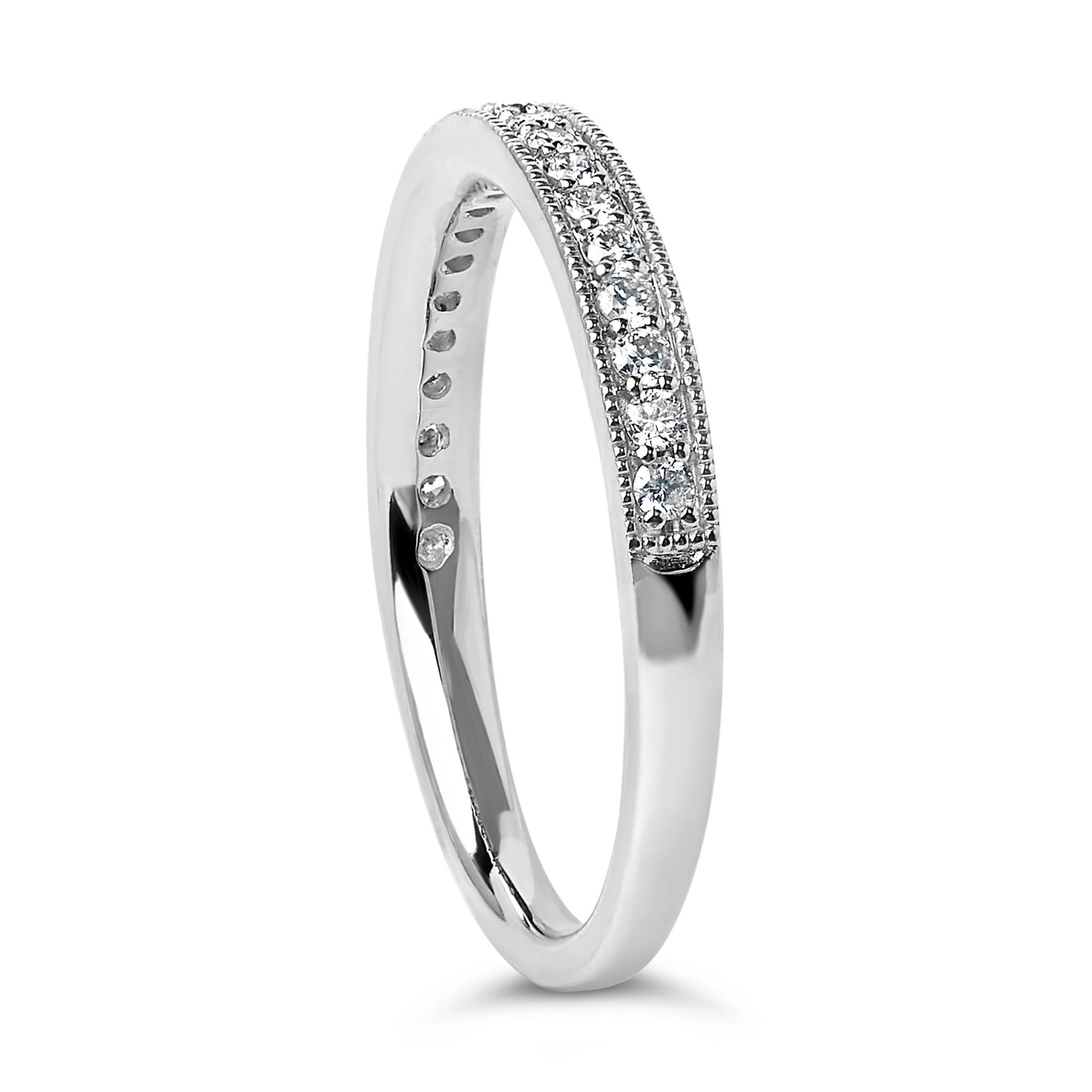 White metal ring with a row of round white gemstones in a micro-pave setting, shown at a slight angle.
