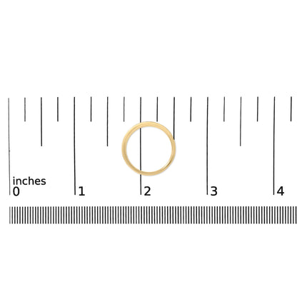 Top-down view of a yellow metal ring with a band partially set with round white gemstones in a micro-pave setting, shown on a measurement scale.