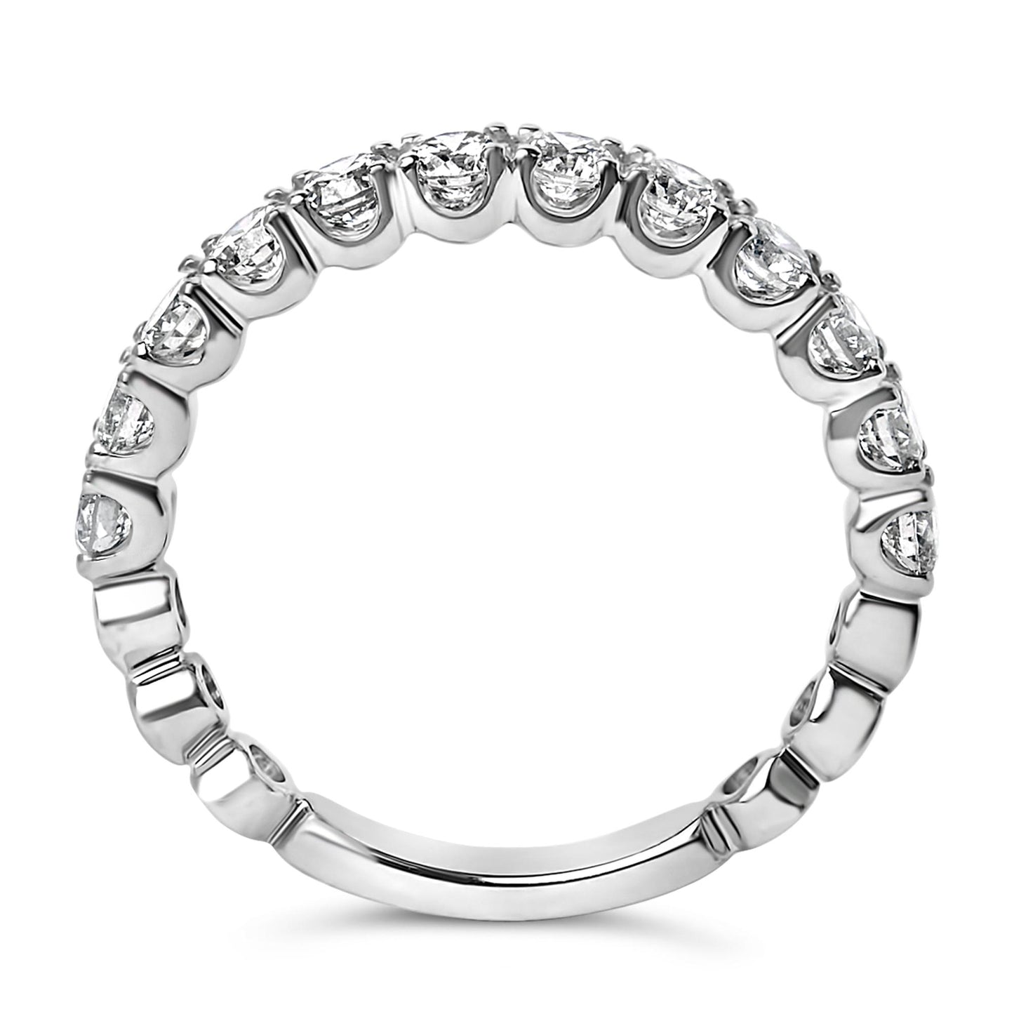 White metal ring with a continuous row of round white gemstones in 4-prong settings, shown in a close-up front-facing angle.