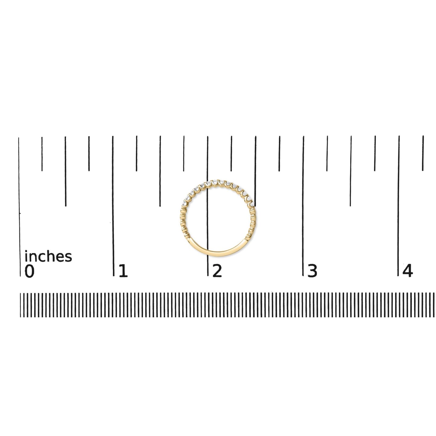 Yellow metal ring with round white gemstones in prong settings, shown flat on a scale with a top-down view.