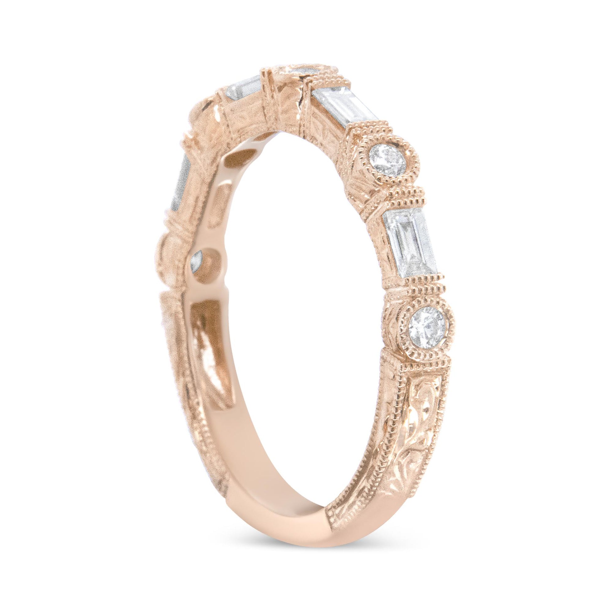 Rose metal ring with alternating round and baguette white gemstones, featuring intricate detailed engraving, shown at a slight angle.