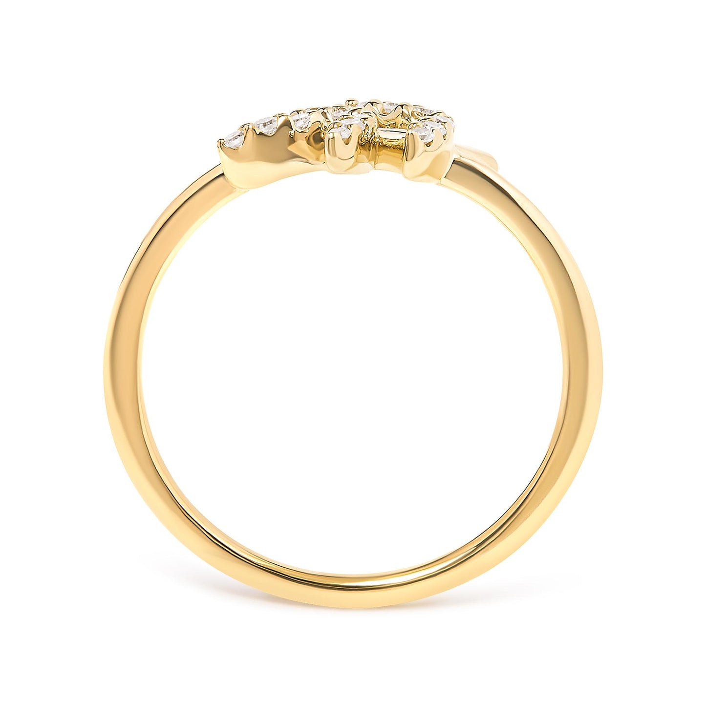 Close-up side view of a yellow metal ring with two clusters of round white gemstones in pave setting on top.