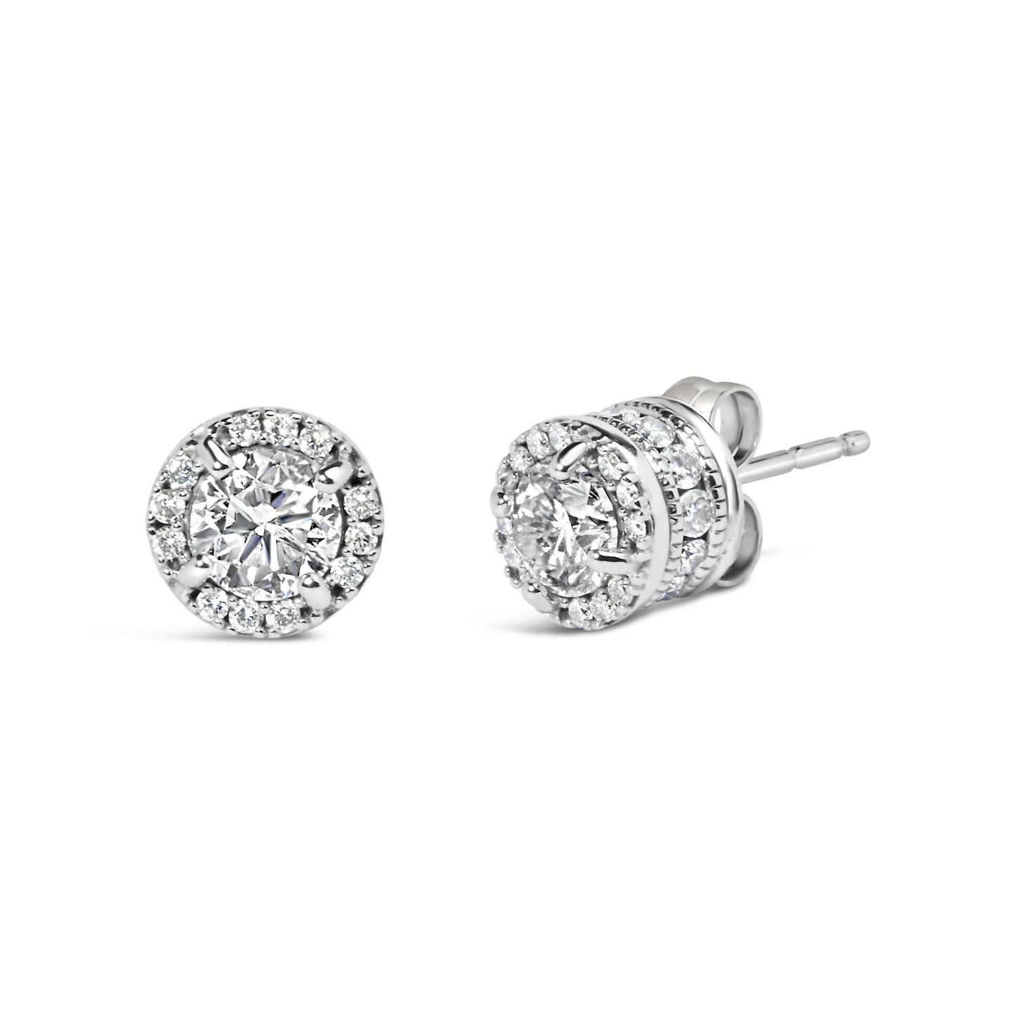 Close-up front and side view of round white metal stud earrings featuring central round white gemstones in four-prong settings, surrounded by two rows of smaller round white gemstones in shared prong and channel settings.