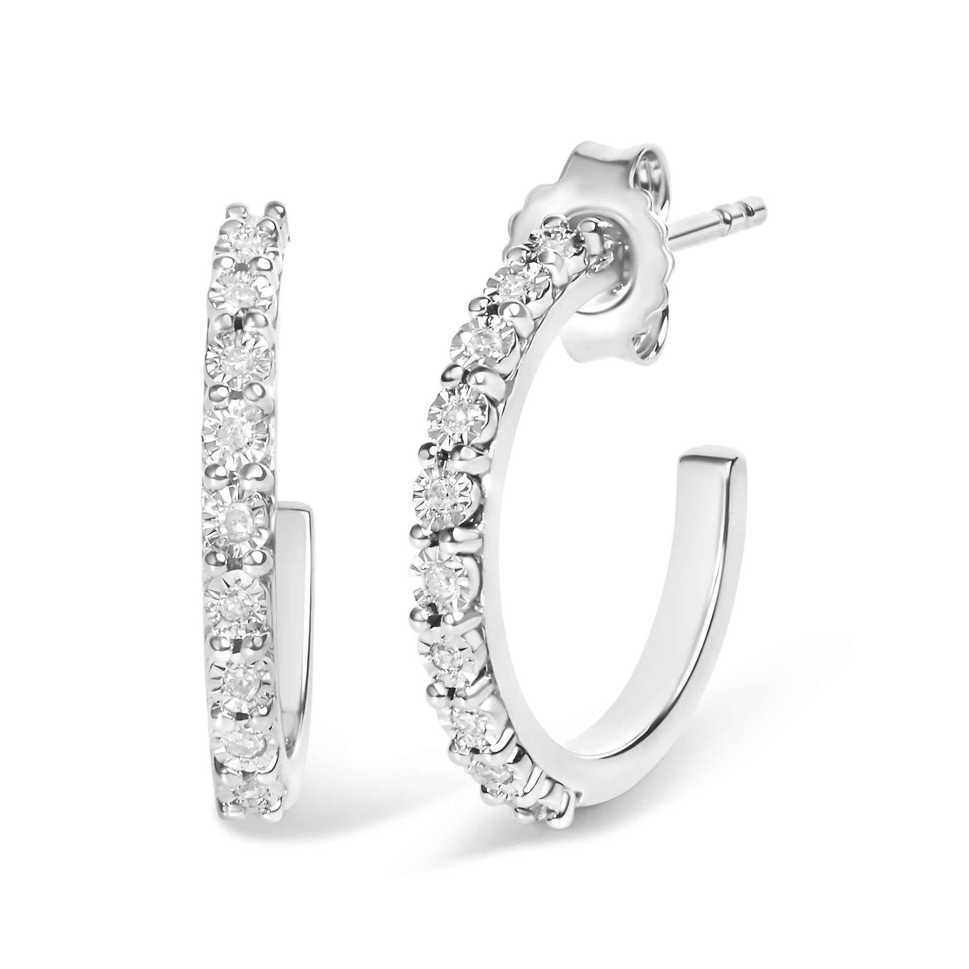 Close-up front and side view of white metal hoop earrings with round white gemstones in a miracle setting.