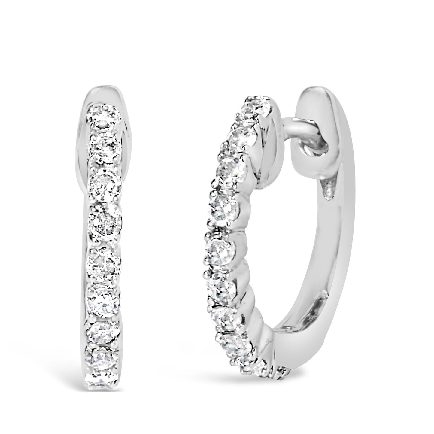 Front and angled side view of a pair of white metal hoop earrings set with round white gemstones in 4-prong settings.