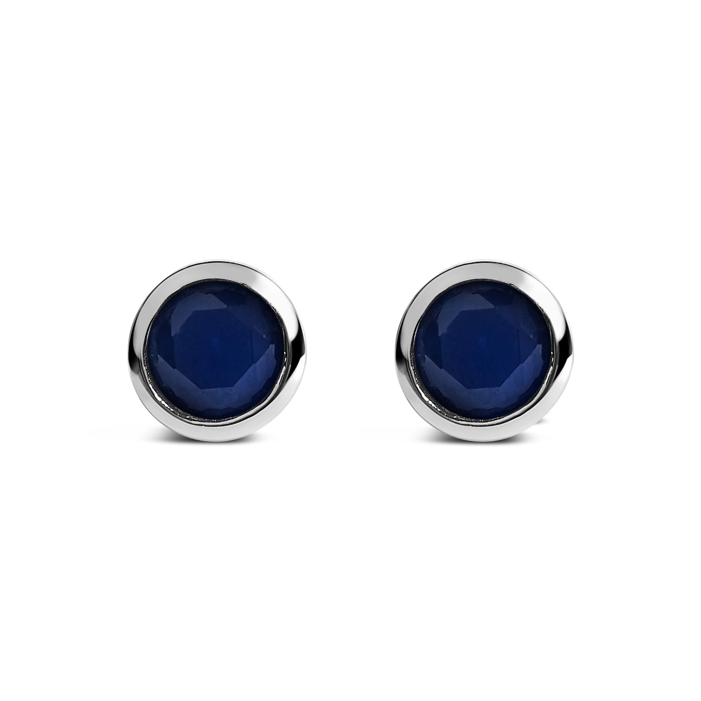 Pair of round blue gemstone stud earrings in a white metal bezel setting, shown from the front on a white background.