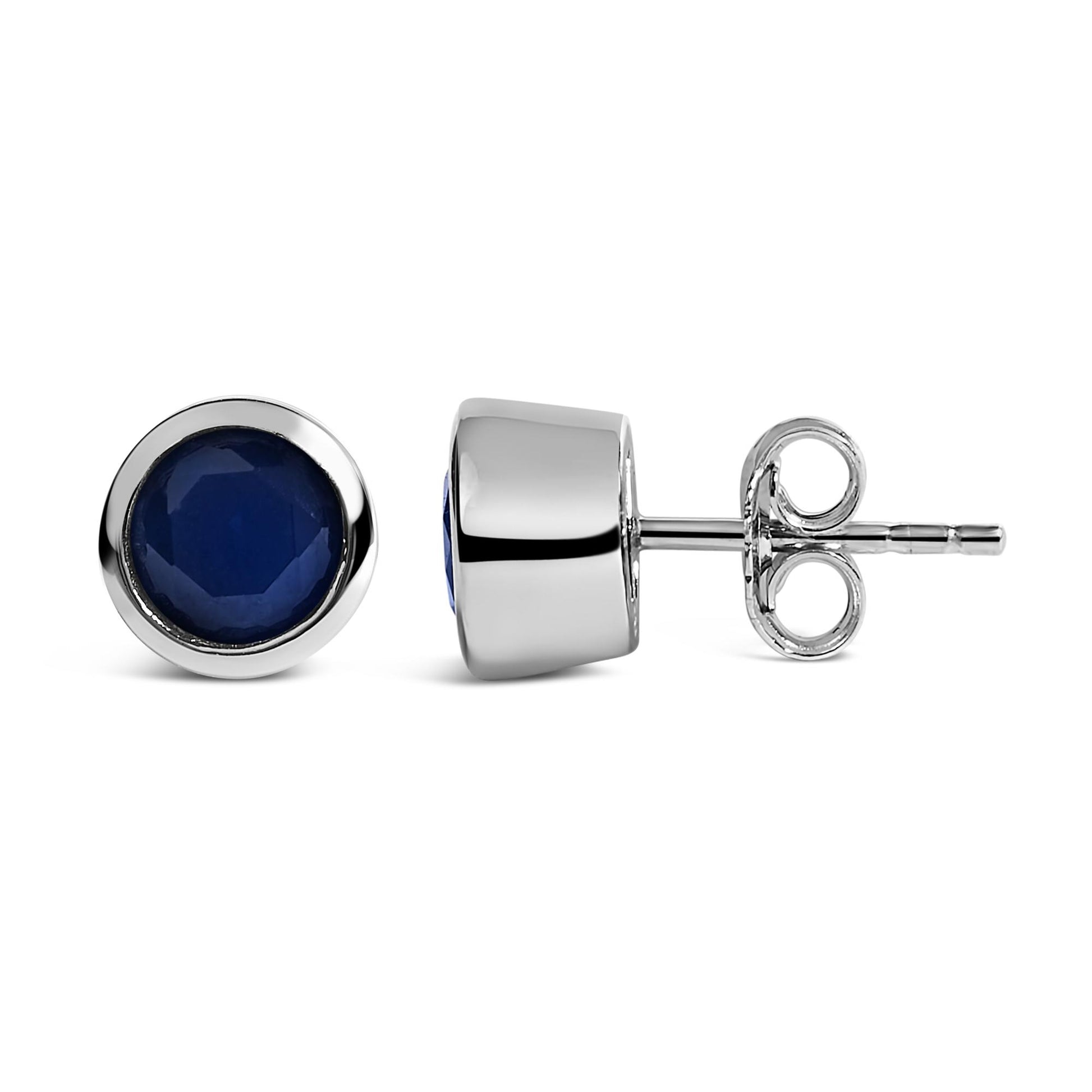 White metal stud earrings with round blue gemstones in bezel settings, shown from front and side angles on a white background.