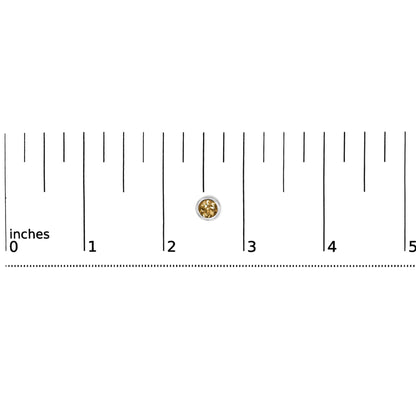 Single white metal earring with round yellow gemstone in bezel setting, shown on a ruler scale, front-facing angle.