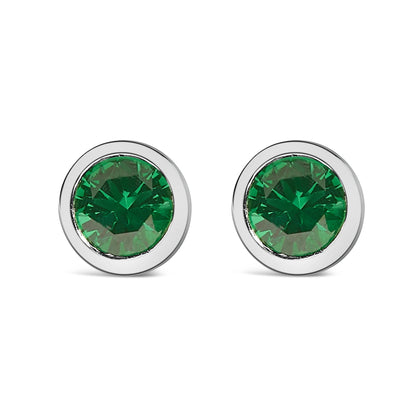 Pair of white metal round stud earrings with green round gemstones in bezel settings, shown from the front on a white background.