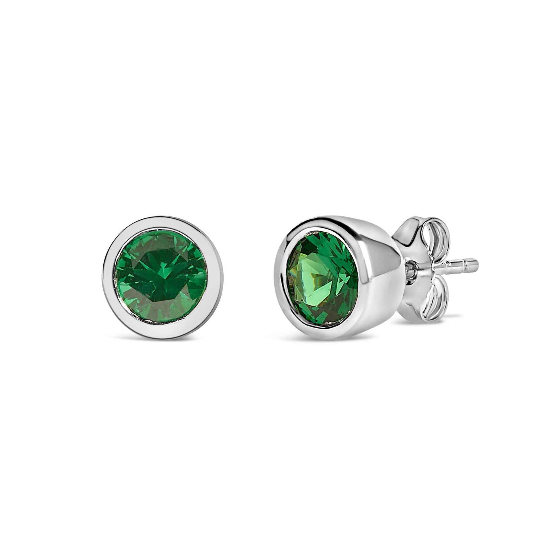 Pair of white metal stud earrings with round green gemstones in bezel settings, shown from front and side angles on a white background.