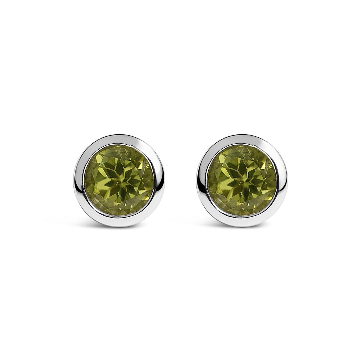 Pair of round white metal stud earrings with green round gemstones in bezel settings, shown from the front on a white background.
