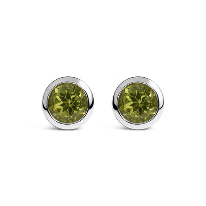 Pair of round white metal stud earrings with green round gemstones in bezel settings, shown from the front on a white background.