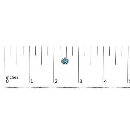 Close-up front view of a single white metal earring with a round blue gemstone in a bezel setting, shown on a ruler for scale.