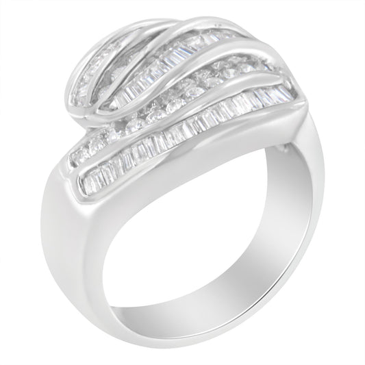 White metal ring with alternating rows of round and baguette white gemstones in channel settings, shown from a slightly angled top view.