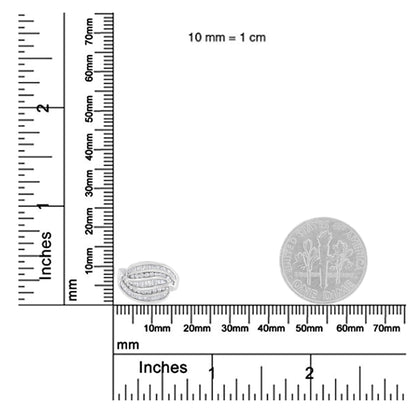Top-down view of a white metal ring with multiple rows of channel-set white round and baguette gemstones, shown on a ruler and scale for size reference.