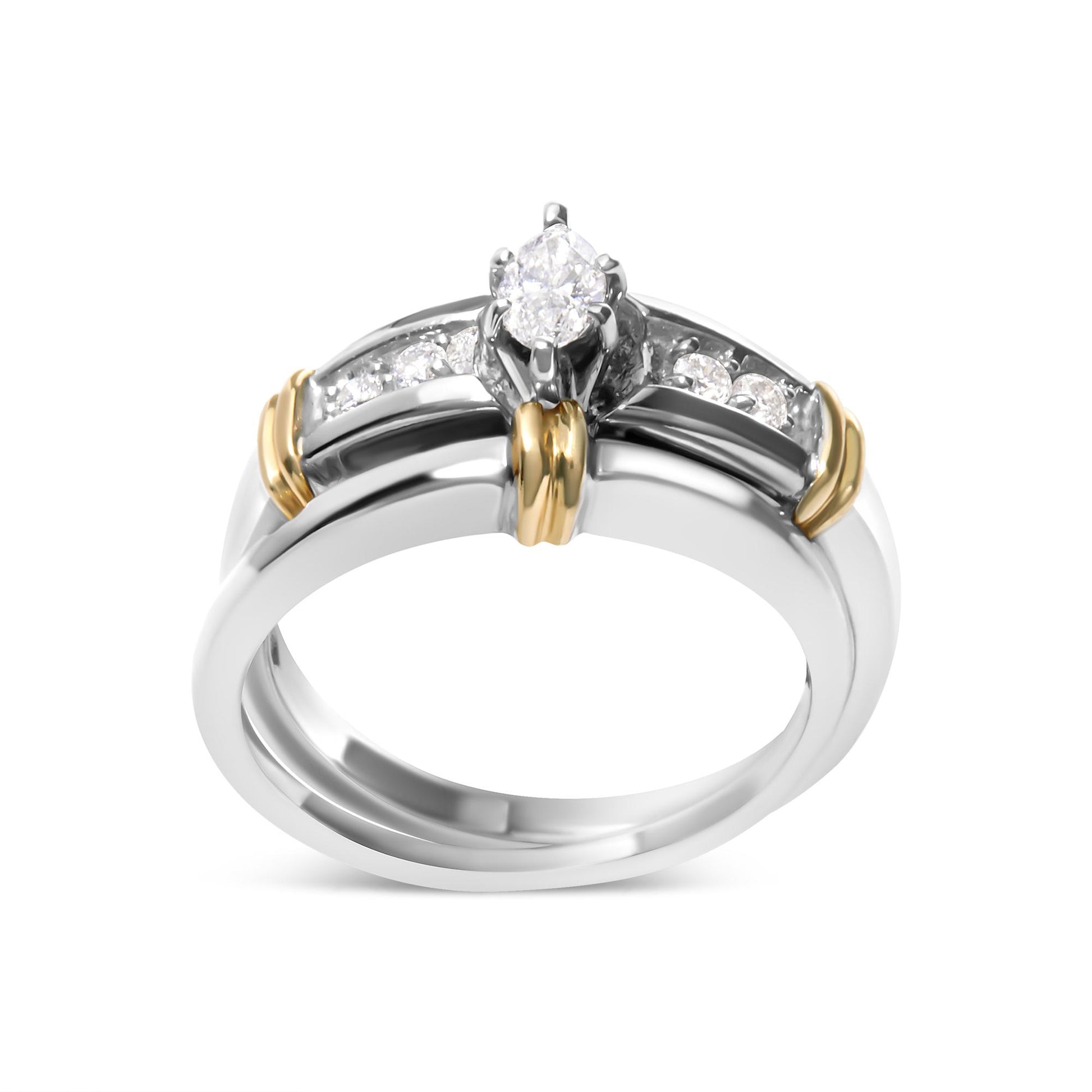 Front angle view of a two-toned ring featuring a marquise-shaped white gemstone in a prong setting and round white gemstones in a pave setting along the band.