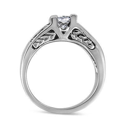 White metal ring shown from the side with two round bezel-set white gemstones and multiple princess-shaped white gemstones in channel and invisible settings.