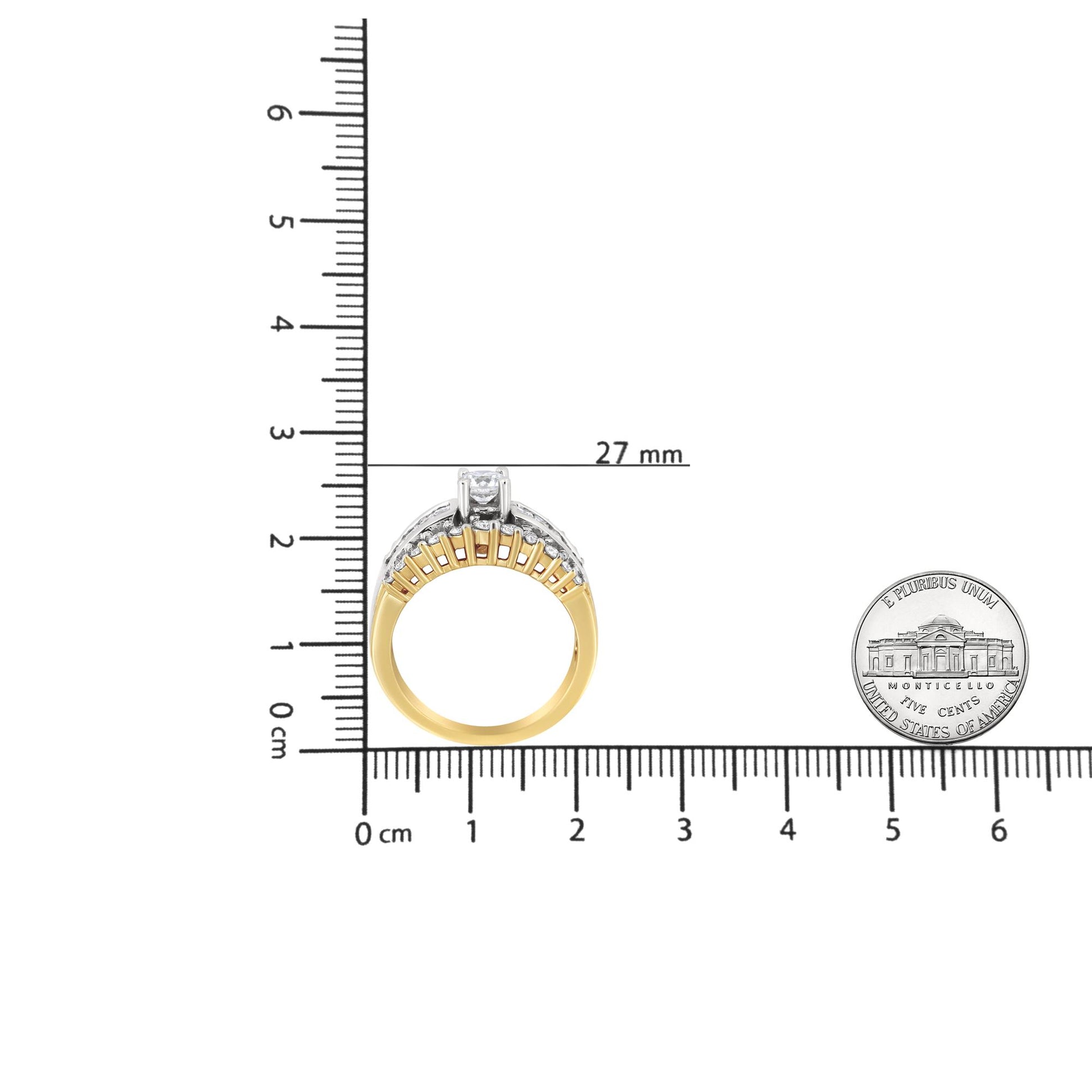 Two-toned ring with round and princess-shaped white gemstones, shown from the side on a ruler for size reference.