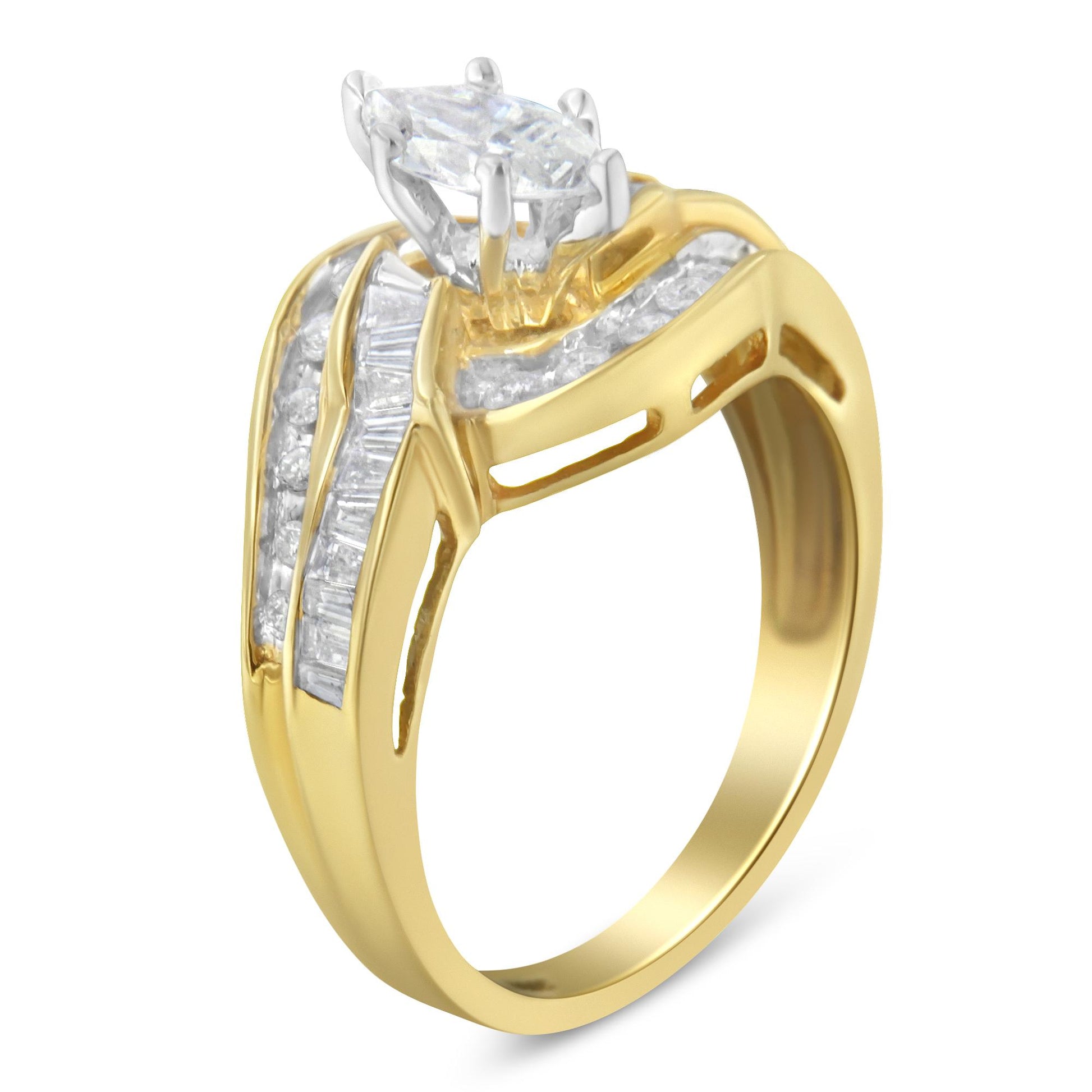 Two-toned ring shown at an angled side view featuring one marquise-shaped prong set white gemstone centerpiece, with baguette and round-shaped white gemstones in channel settings along the band.