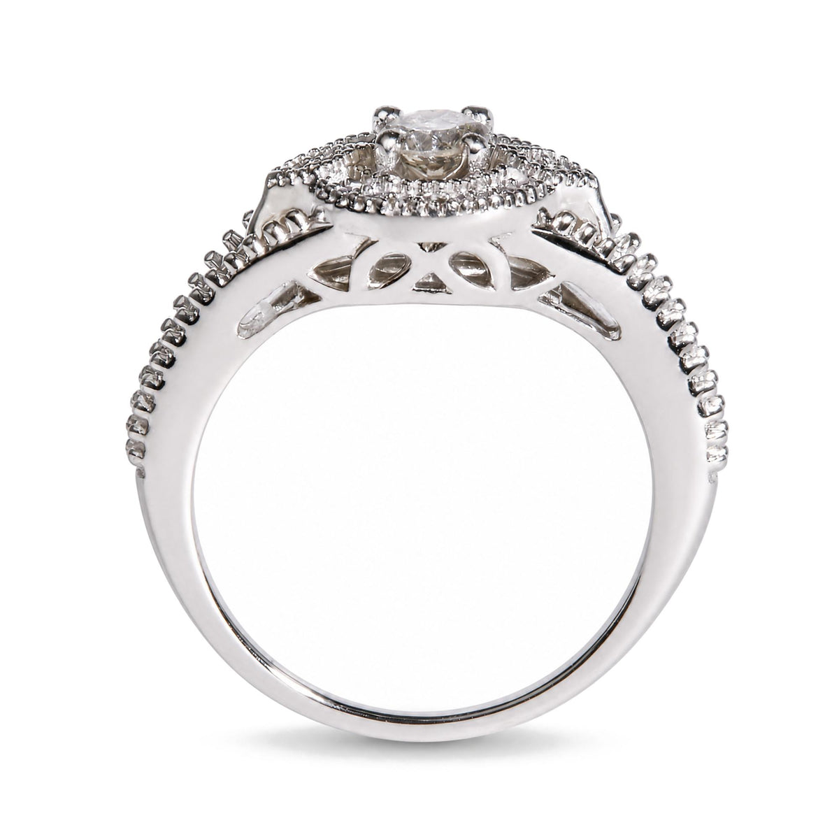 Close-up front angle of a white metal ring with a central round white gemstone in prong setting, surrounded by smaller round white gemstones in prong settings along the band.