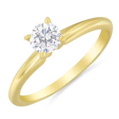 Close-up angled view of a yellow metal ring featuring a single round white gemstone in a prong setting.