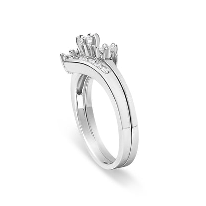 Close-up angled view of a pair of white-colored rings adorned with multiple round-shaped white gemstones in prong settings along the bands.
