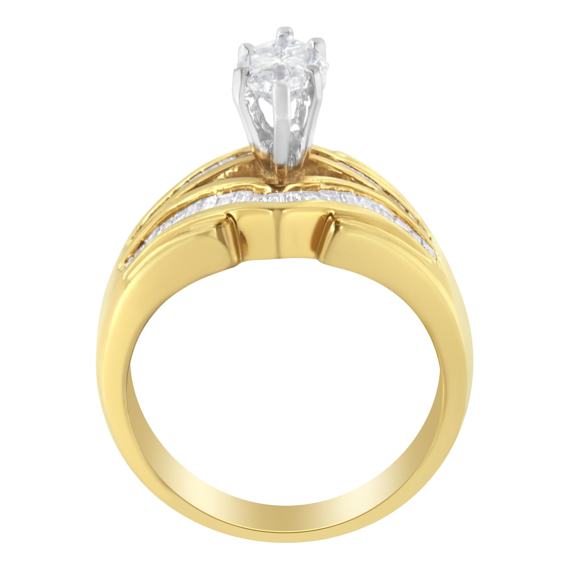 Front view of a yellow and white metal ring featuring a prong-set white pie-shaped gemstone on top and multiple channel-set white baguette-shaped gemstones along the band.