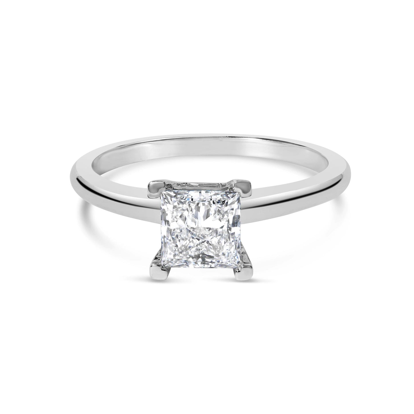 Front view of a white metal ring with a single princess shape white gemstone in a prong setting.