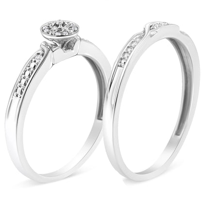 Two white metal rings with round white gemstones in prong settings, shown from a front angle.