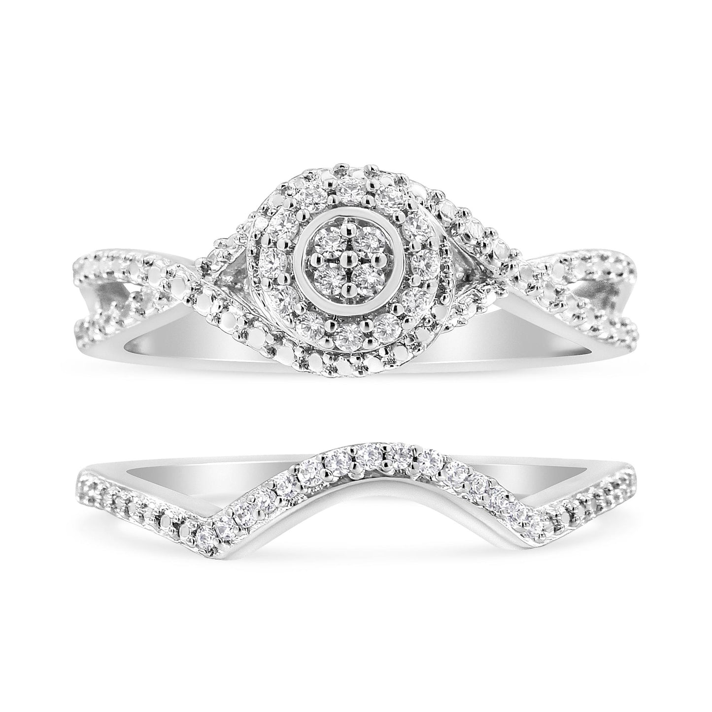 Front angle view of two white metal rings, one featuring a round cluster of white gemstones in the center with an infinity-style band also accented with white gemstones, the other ring has a wave-shaped band with white gemstones along the top.