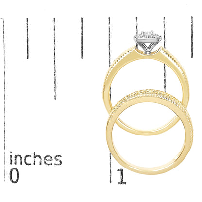 Yellow metal two-ring set with one ring featuring a raised cluster of white gemstones, shown on a ruler for size reference from a top angle.