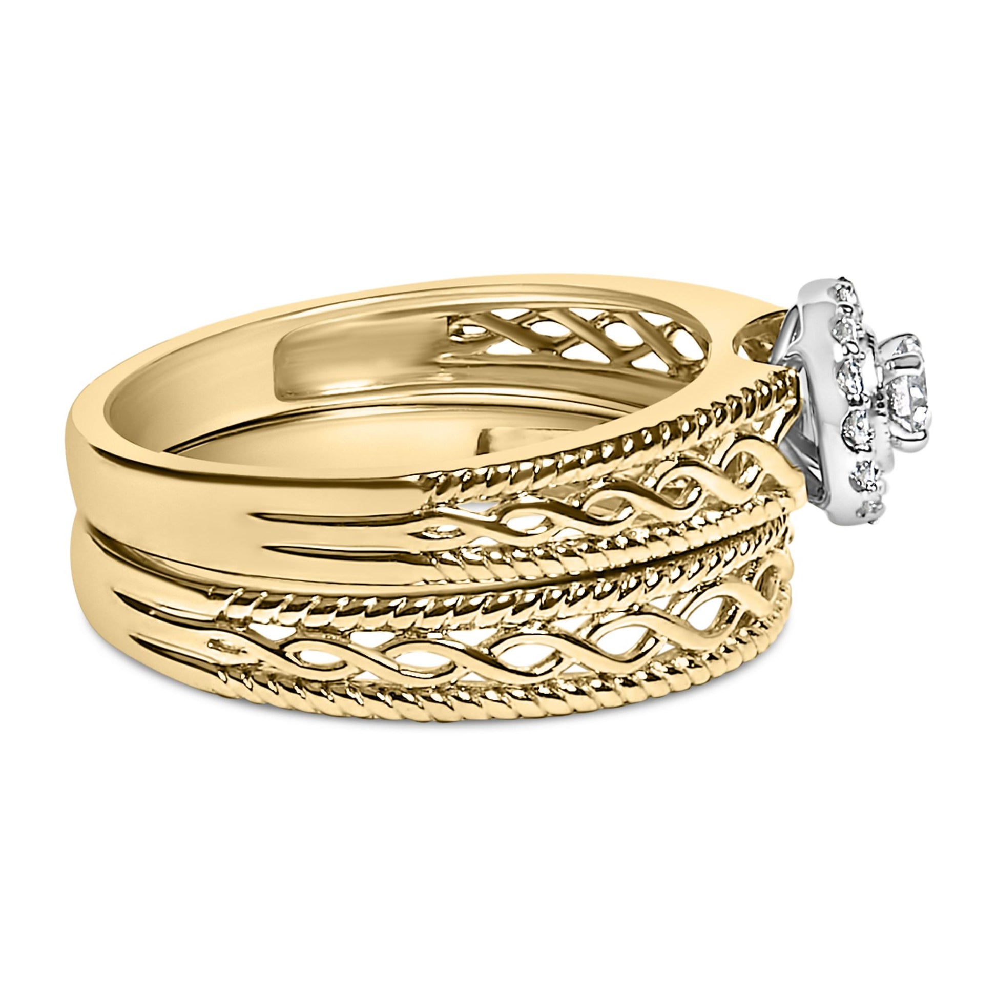 Yellow metal ring with intricate rope and vine-like detailing, featuring one larger and multiple smaller white gemstones in prong settings, shown in a close-up side angle.