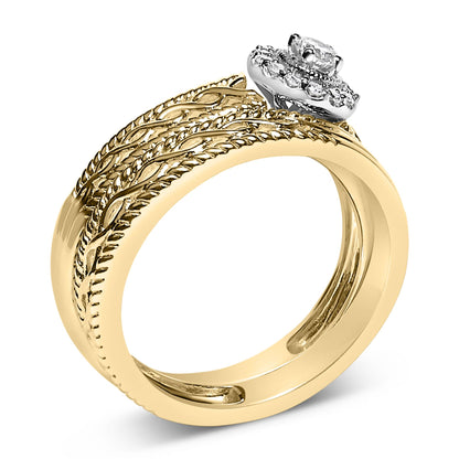 Yellow metal ring with braided texture band and a cluster of white round gemstones in prong settings on top, shown in a front angle view.