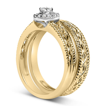 Close-up angled view of a yellow metal ring with a detailed braided pattern on the band, featuring a white metal setting holding one round white gemstone in the center, surrounded by a halo of smaller round white gemstones.