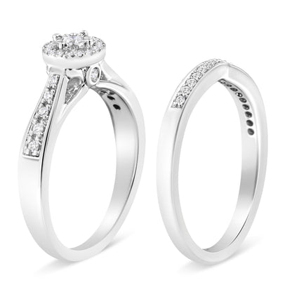 Two white metal rings with multiple round white gemstones in prong settings, shown from an angled side view.