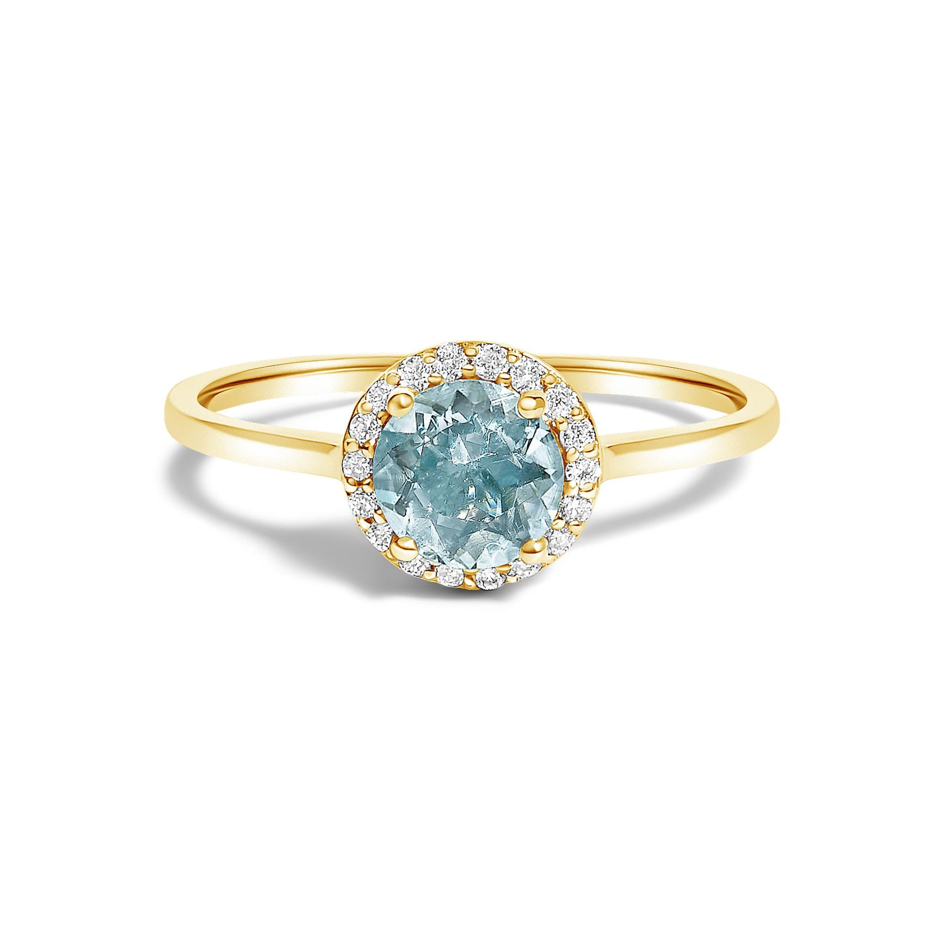 Front view of a yellow metal ring with a round blue gemstone in a four-prong setting, surrounded by a halo of round white gemstones in shared prong settings.