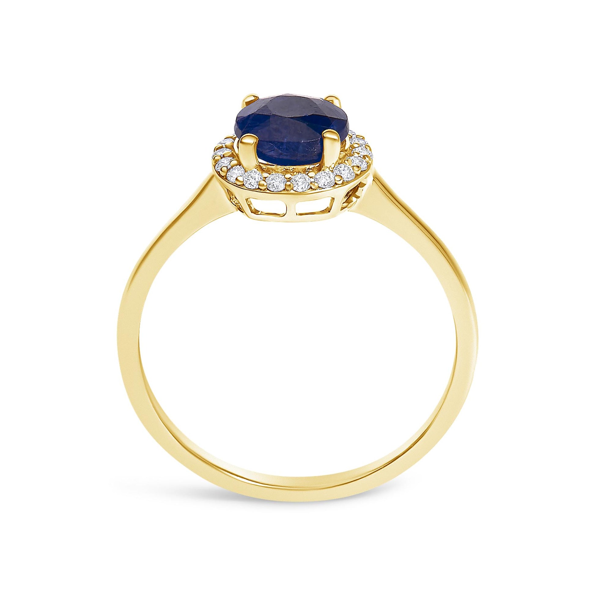 Yellow metal ring with a round blue gemstone in a four-prong setting, surrounded by a circle of small round white gemstones in shared prong settings, shown in a front-facing angle.