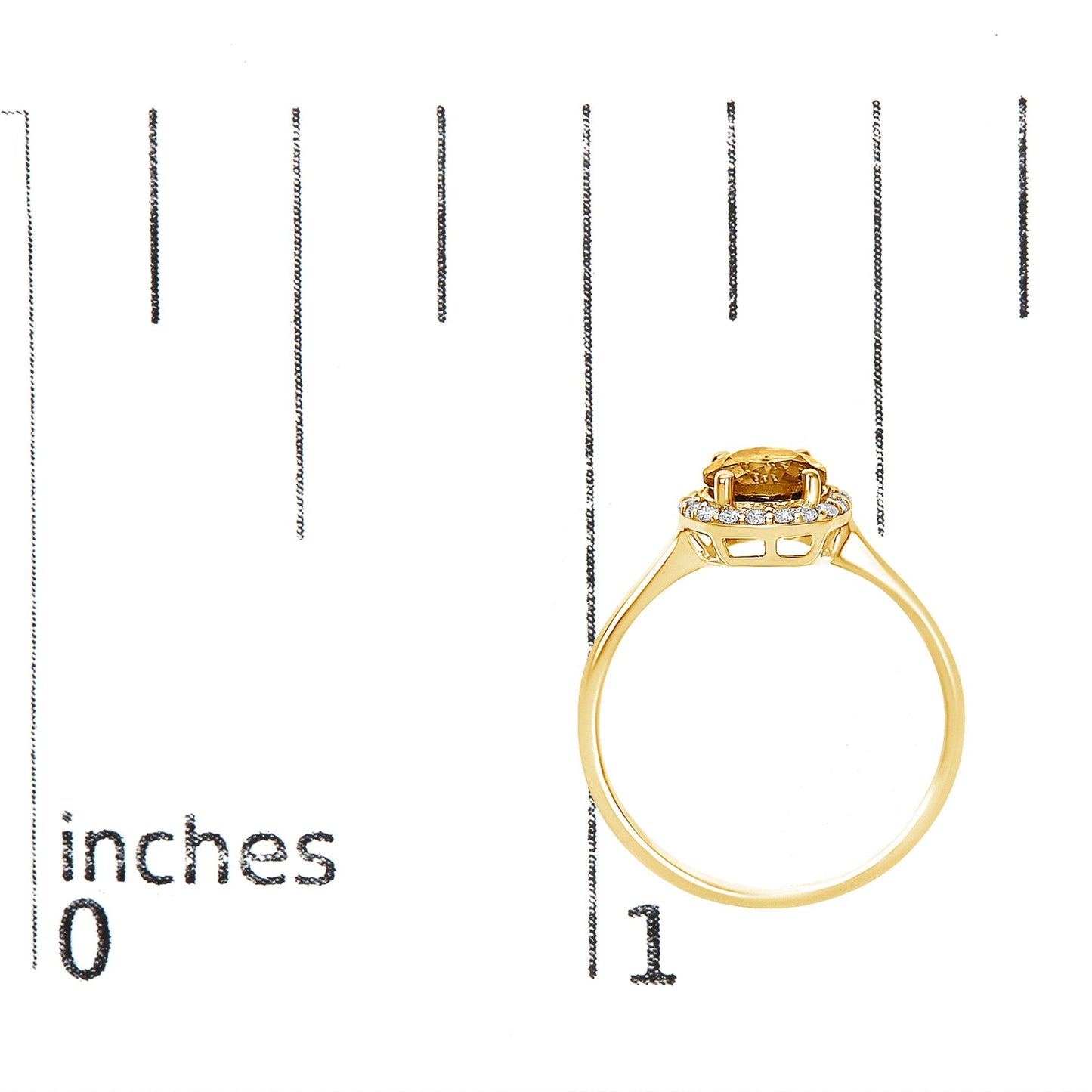 Yellow metal ring with a round orange gemstone in a four-prong setting surrounded by small white gemstones in a shared prong setting, shown on a scale from a side angle.