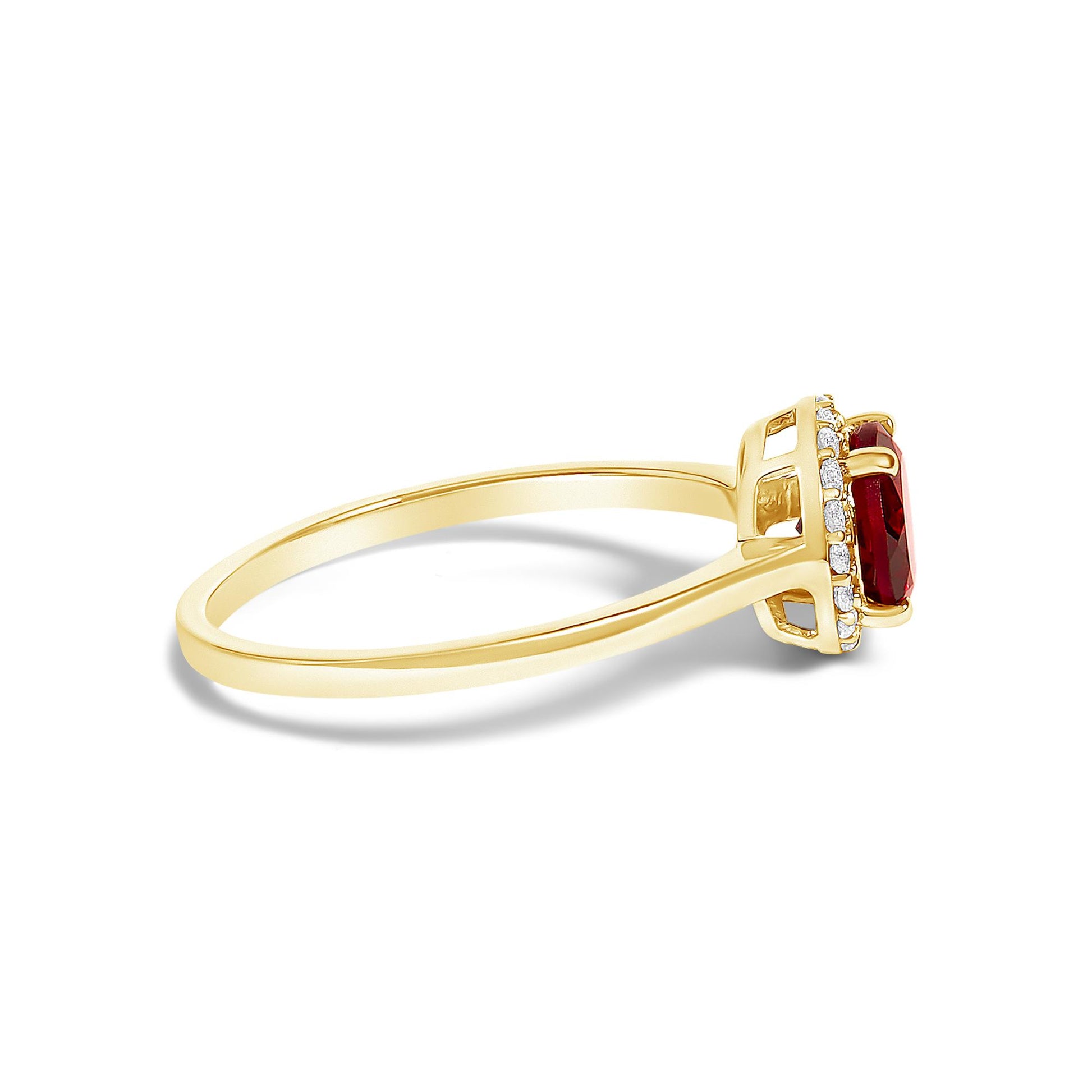 Side angle view of a yellow ring with a central red gemstone in a four-prong setting, surrounded by multiple small white round gemstones in a shared prong setting.