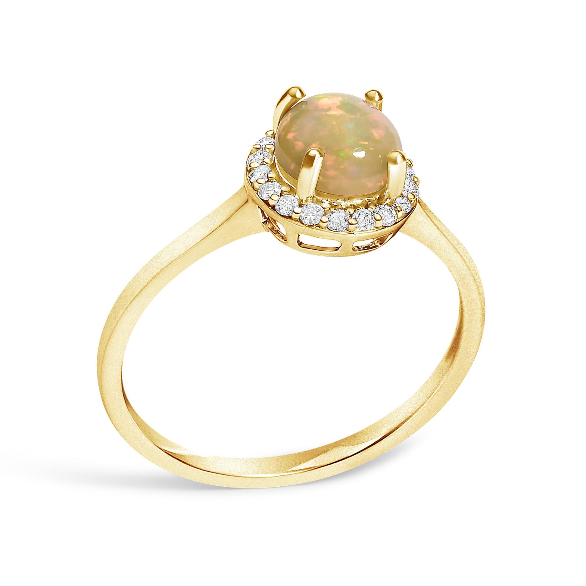 Yellow metal ring with a round multi-color opal gemstone set in four prongs, surrounded by a halo of round white gemstones in shared prong setting, shown from a slightly angled side view.