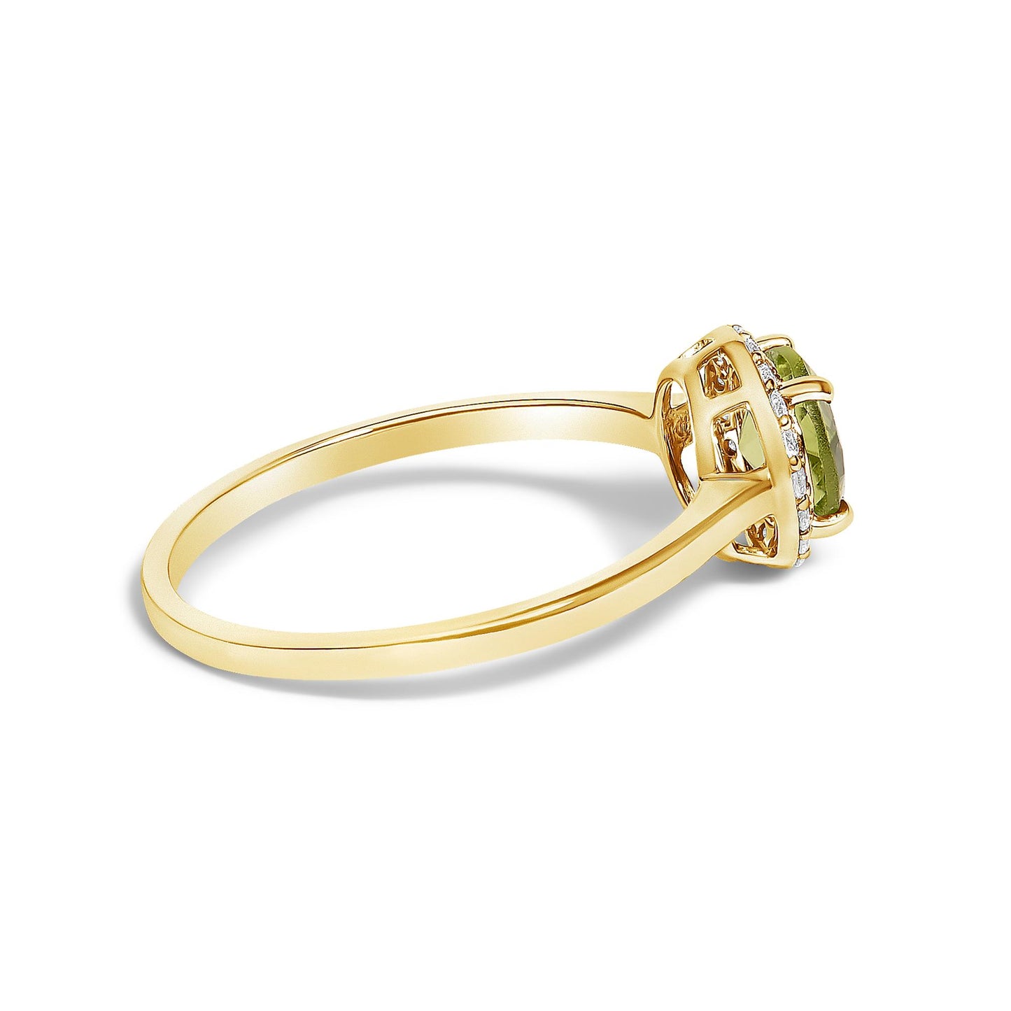 Side angle view of a yellow ring featuring a round green gemstone in a four-prong setting surrounded by multiple small round white gemstones in shared prong settings.