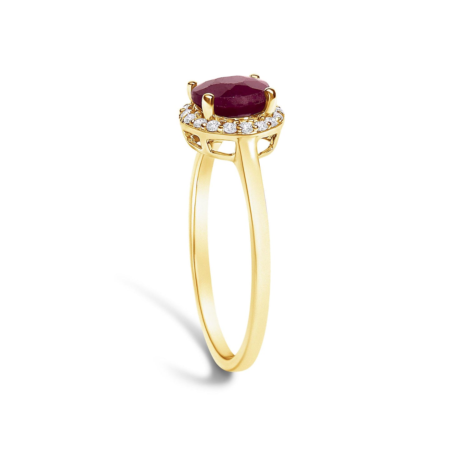 Yellow ring shown from a side angle featuring a round red gemstone held by four prongs, surrounded by a halo of round white gemstones in shared prong setting.
