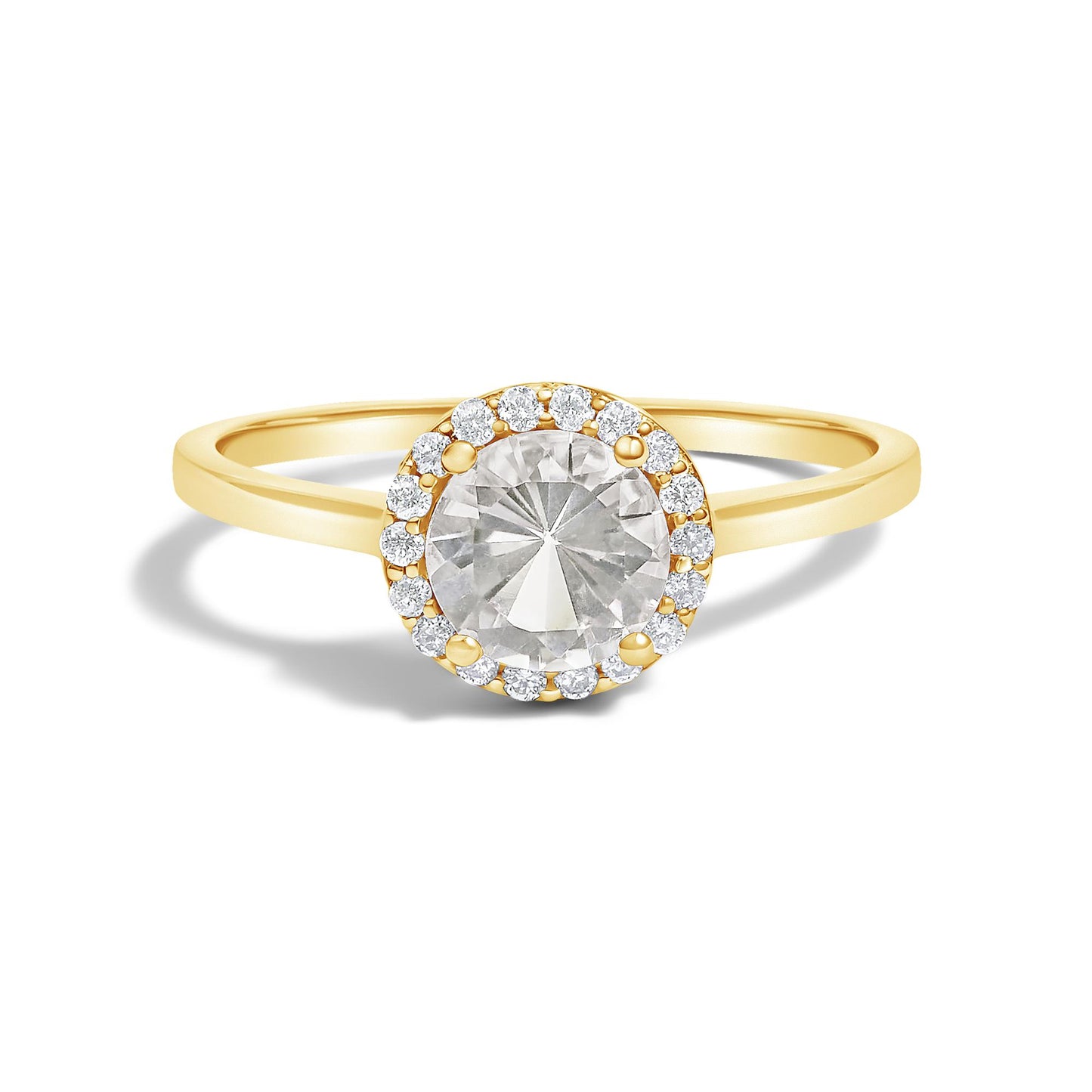 Yellow metal ring with a large round white gemstone in a 4-prong setting, surrounded by smaller round white gemstones in a shared prong setting, front-facing angle on a white background.