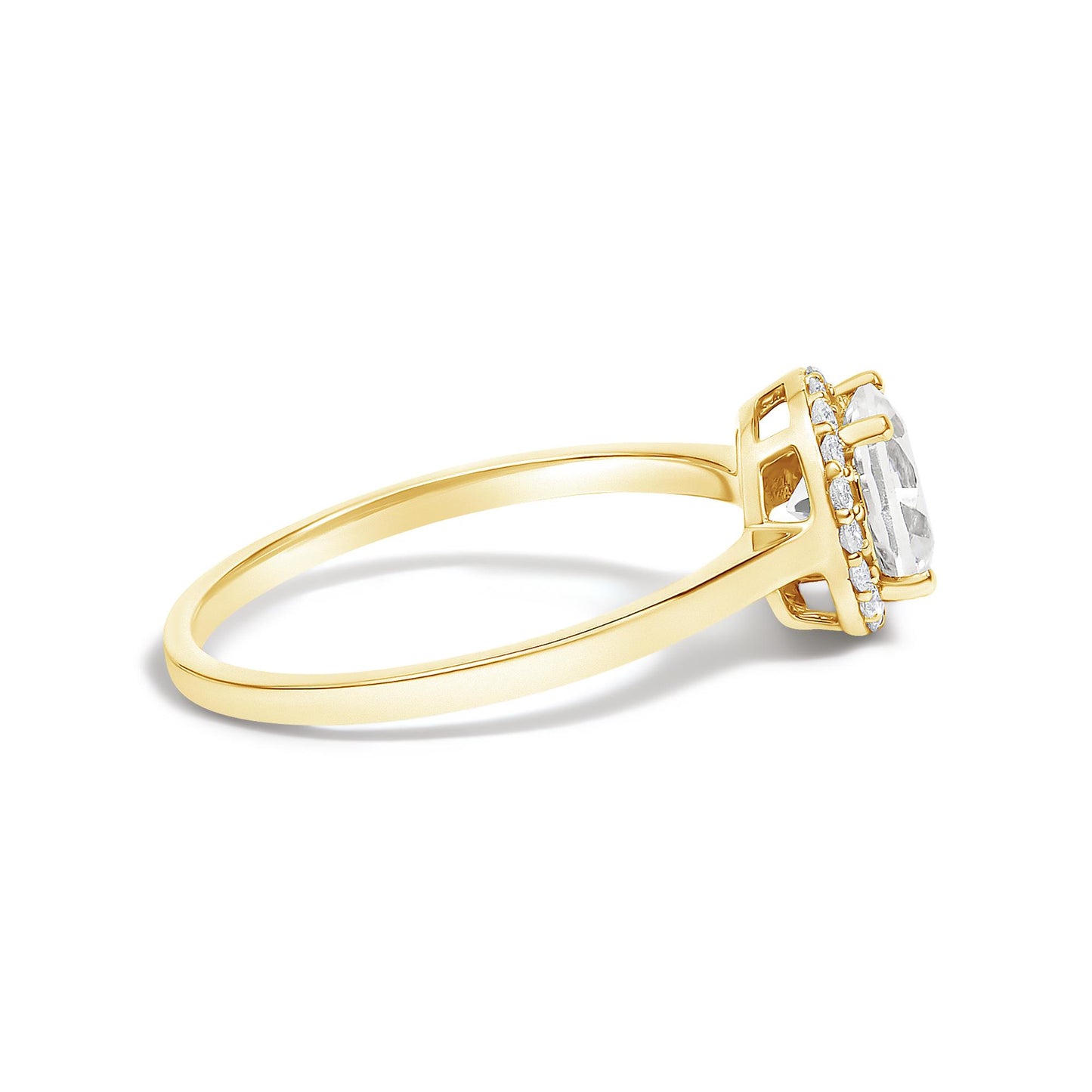 Side angle view of a yellow metal ring with a raised center setting featuring a single round white gemstone held by four prongs, surrounded by multiple small round white gemstones in a shared prong setting.